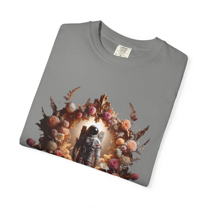 boho astronaut t-shirt featuring an astronaut surrounded by floral decorations on a gray shirt.