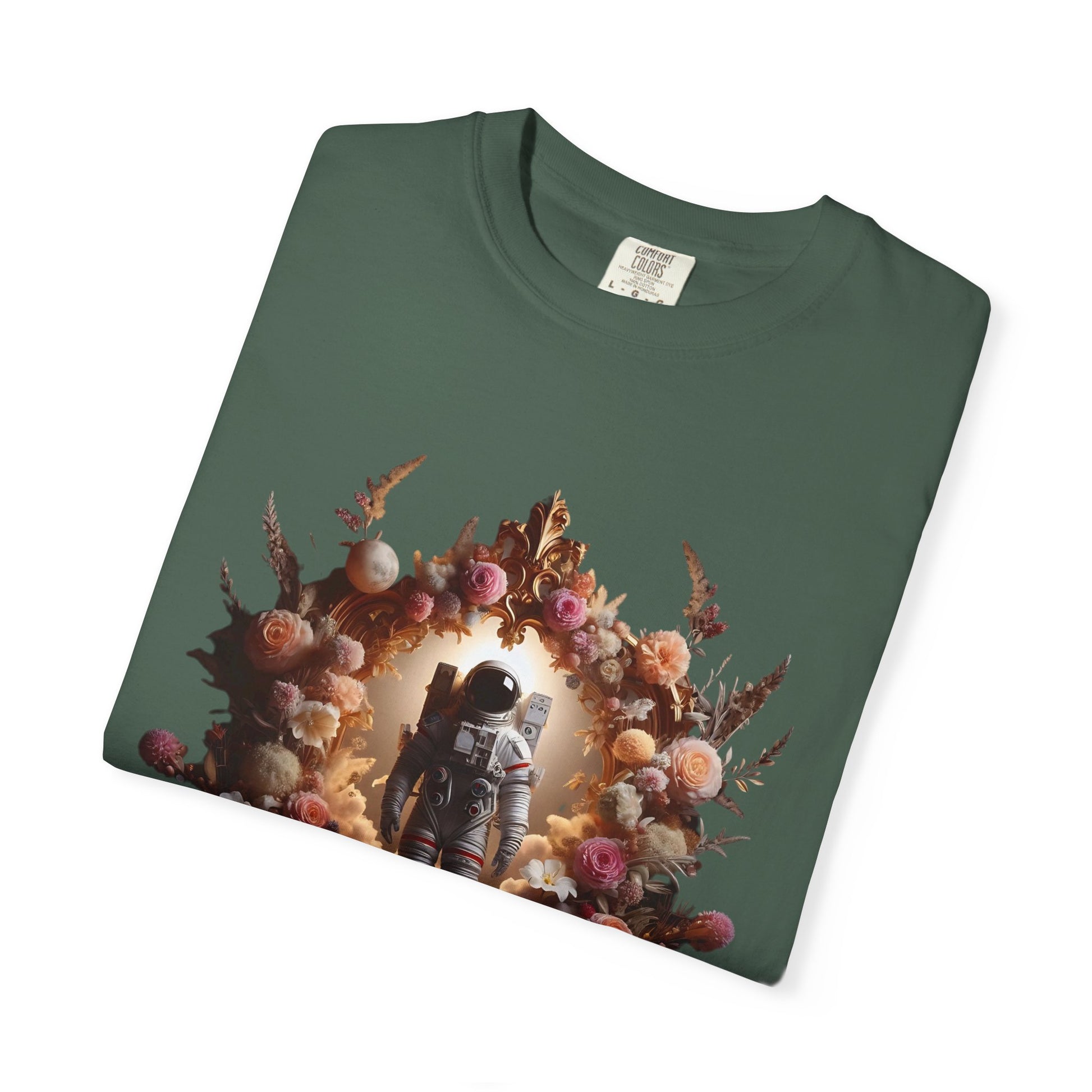 boho astronaut t-shirt featuring an astronaut surrounded by flowers on a green t-shirt, perfect for space lovers.
